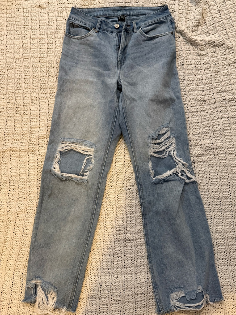 Women’s Light Blue Ripped Jeans